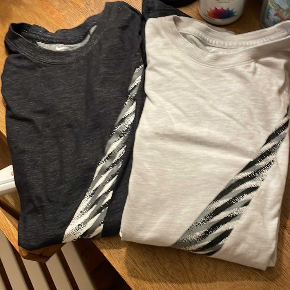 Two long sleeve Nike dri-fit tops